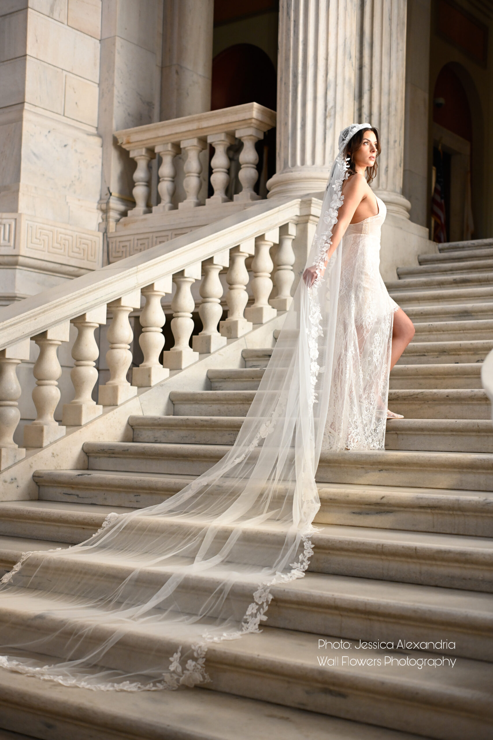 Bride comparing veil colors against her wedding dress to find the perfect match